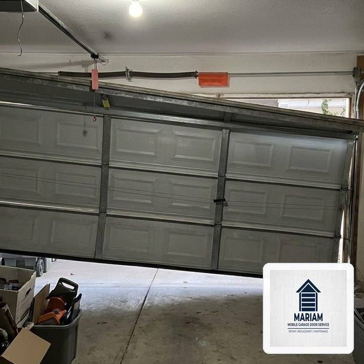 Off-Track Garage Door Emergency Realignment & Laser Calibration in Brookline, MA